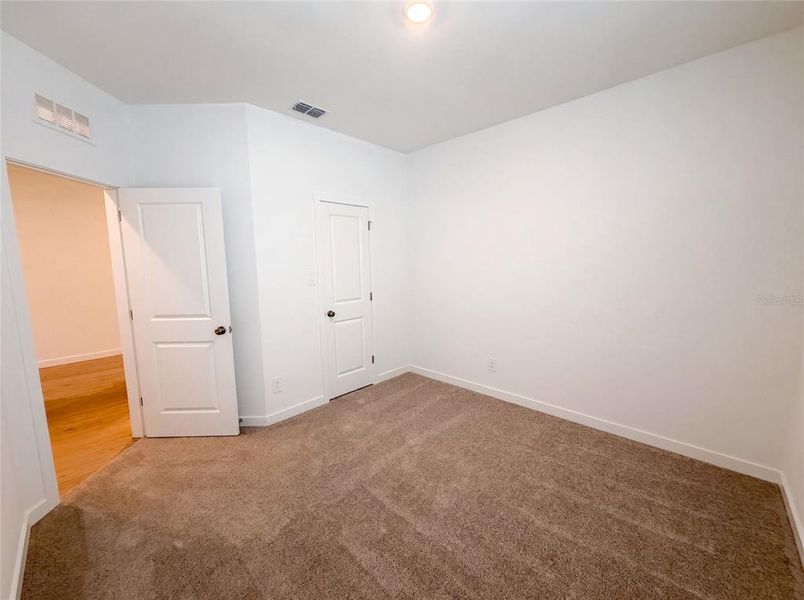 Spacious, unfurnished interior of a new home in Hidden Ridge, Groveland (Image 17).