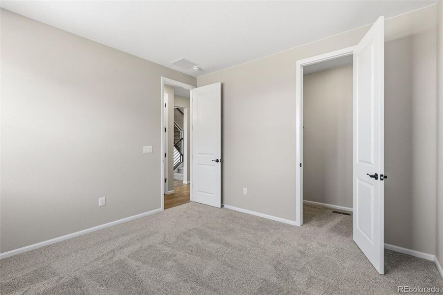 Spacious, unfurnished interior of a new home in The Estates Collection at Talon Pointe, Thornton (Image 25).