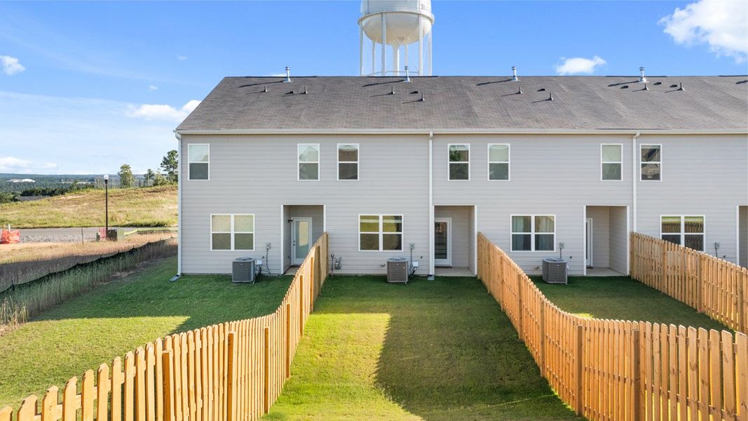 Front exterior of a new home in Laurel Park Townhomes, Hephzibah, GA, highlighting curb appeal (Image 20).