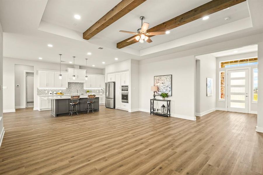 The Living Room is grand in size and can accommodate a myriad of layouts and designs. With a neutral palette like this, almost everything goes!