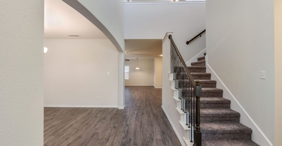 Representative exterior photo of a completed home built from the Adina by Impression Homes in Heartland, Heartland, TX (Image 15). Representative exterior photo of a completed home built from the Adina by Impression Homes in Heartland, Heartland, TX (Image 15).