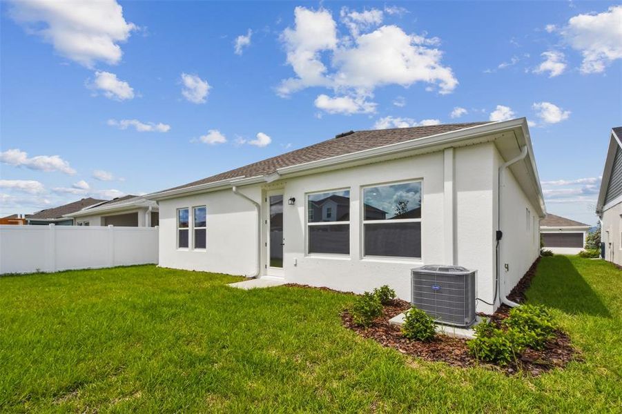 Exterior details and patio area of a home in The Peninsula at Rhodine Lake, Riverview (Image 2).