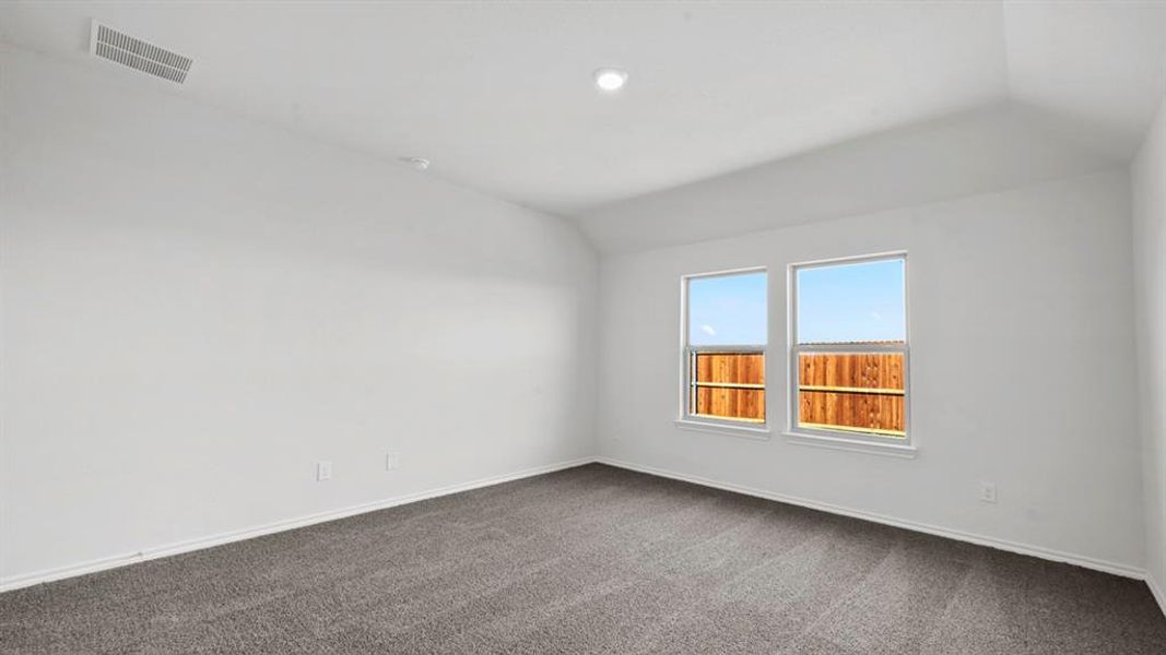 Room featuring neutral gray carpeting and white painted walls