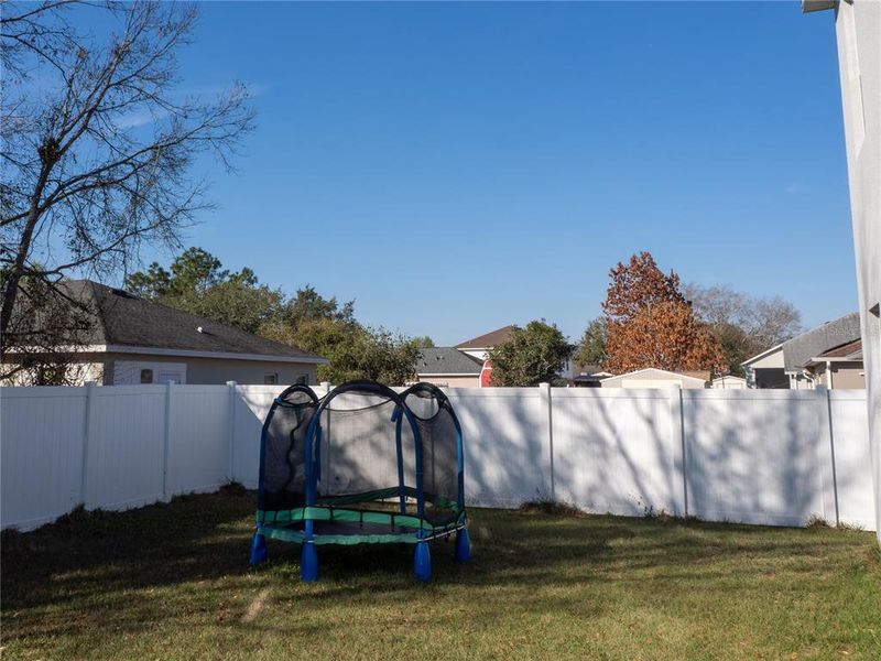 Exterior details and patio area of a home in Poinciana Enclave, Kissimmee (Image 20).