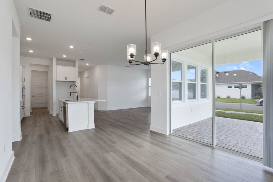 Representative furnished interior of a home built from the Hemingway by Rockwell Homes in Northlake At Ovation, Winter Garden (Image 11).