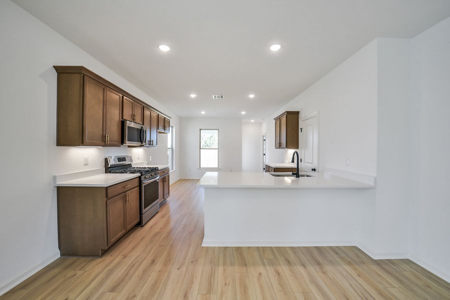 Furnished interior view inside a new home in Mostyn Springs, Magnolia (Image 6).