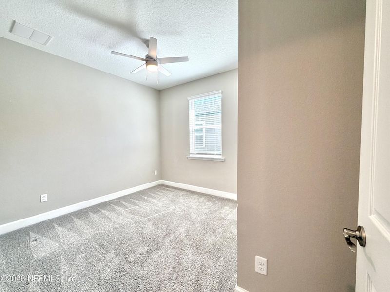 Spacious, unfurnished interior of a new home in Seasons at TrailMark, St. Augustine (Image 50).