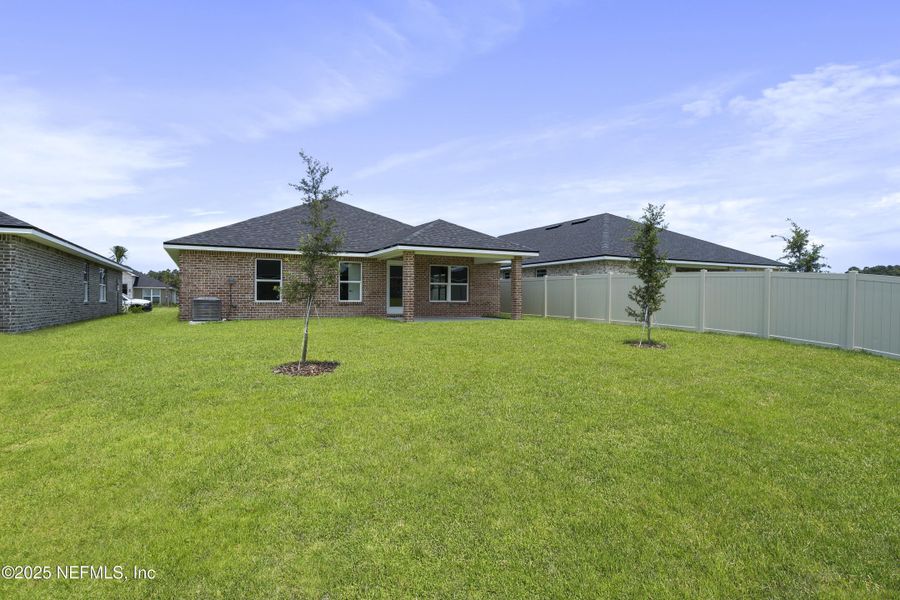Front exterior of a new home in Shadow Crest at Rolling Hills, Green Cove Springs, FL, highlighting curb appeal (Image 16). Front exterior of a new home in Shadow Crest at Rolling Hills, Green Cove Springs, FL, highlighting curb appeal (Image 16).