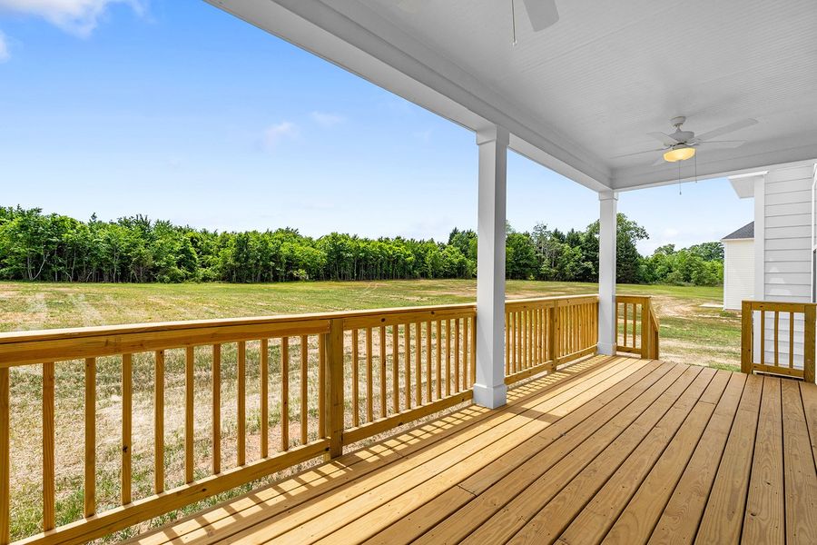 Exterior details and patio area of a home in Lilah Grove, Summerfield (Image 4).