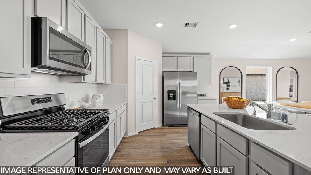 Furnished interior view inside a new home in Sunterra Lakes, Brookshire (Image 15).