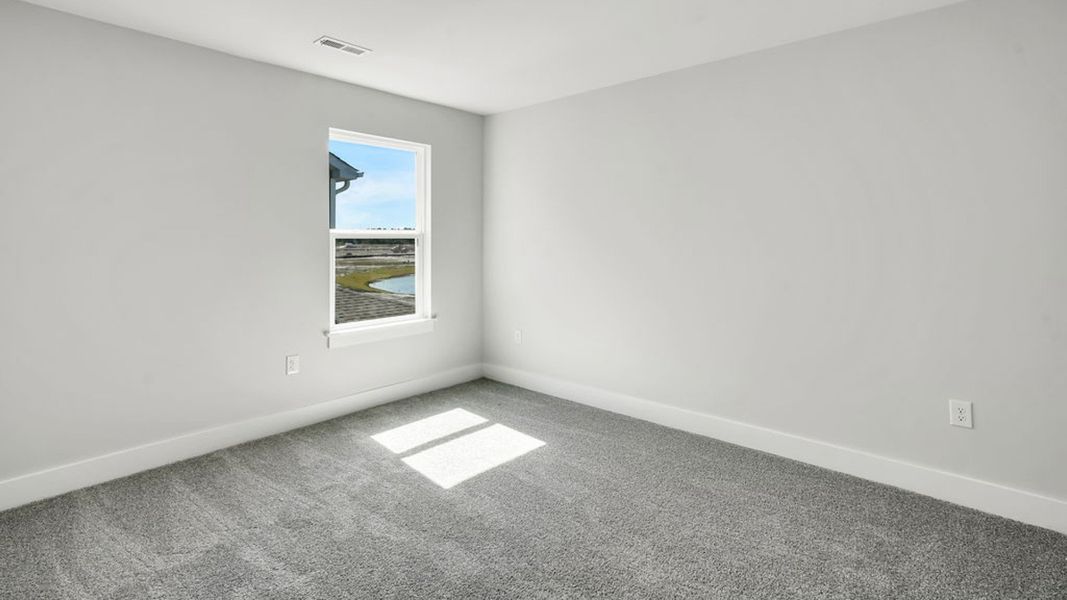 Spacious, unfurnished interior of a new home in Sidbury Station, Castle Hayne (Image 35).