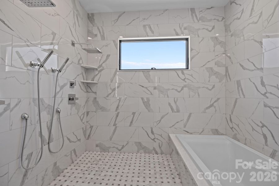 Roman Shower with soaking tub.