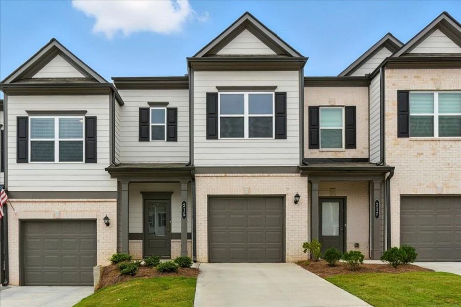 Front exterior of a new home in , Cartersville, GA, highlighting curb appeal (Image 1). Front exterior of a new home in , Cartersville, GA, highlighting curb appeal (Image 1).