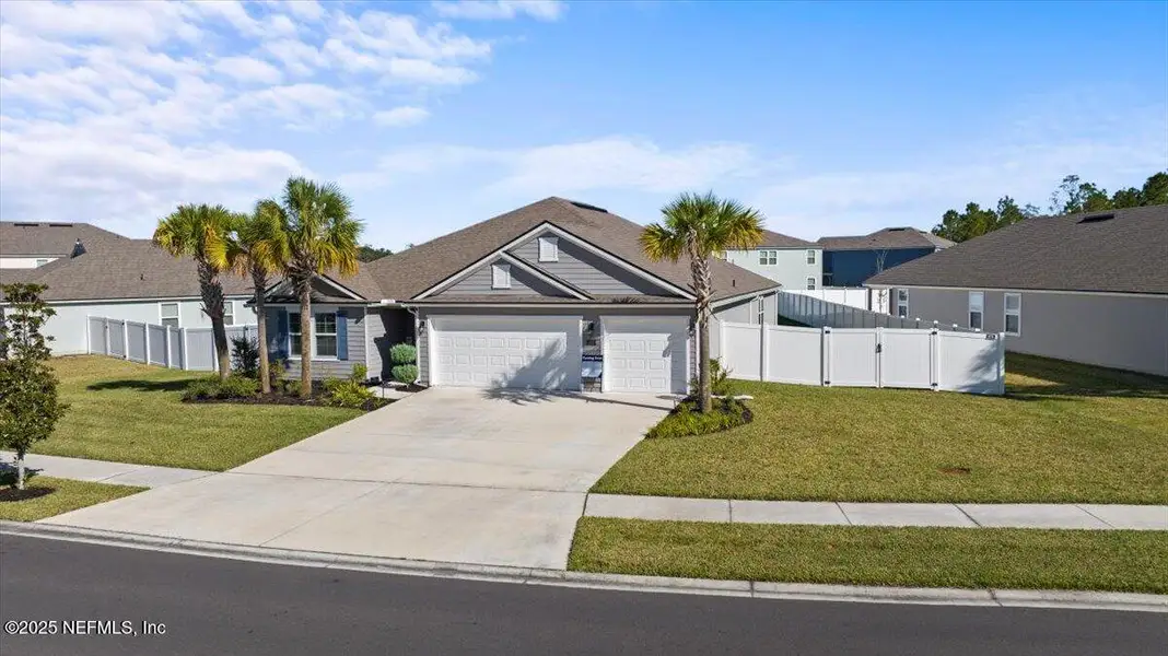 Front exterior of a new home in Cross Creek, Green Cove Springs, FL, highlighting curb appeal (Image 24).