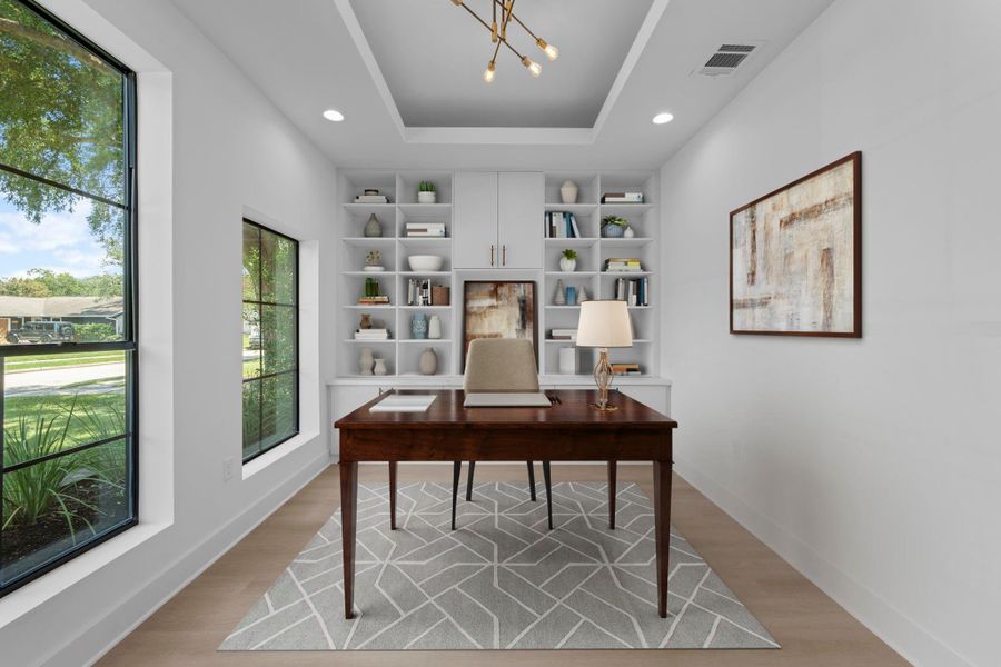 Virtually Staged: Nestled quietly in this immaculate home is the stunning home office! Featuring engineered wood floors, a tray ceiling, and large windows. Virtually Staged: Nestled quietly in this immaculate home is the stunning home office! Featuring engineered wood floors, a tray ceiling, and large windows.