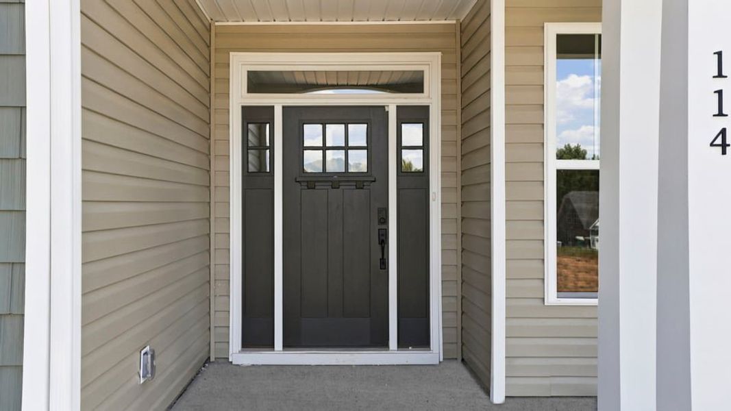 Exterior details and patio area of a home in Blue Ridge Trail, Fountain Inn (Image 3).