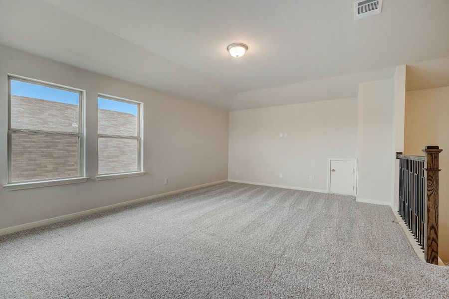 Second floor landing in the Pearl floorplan at a Meritage Homes community.