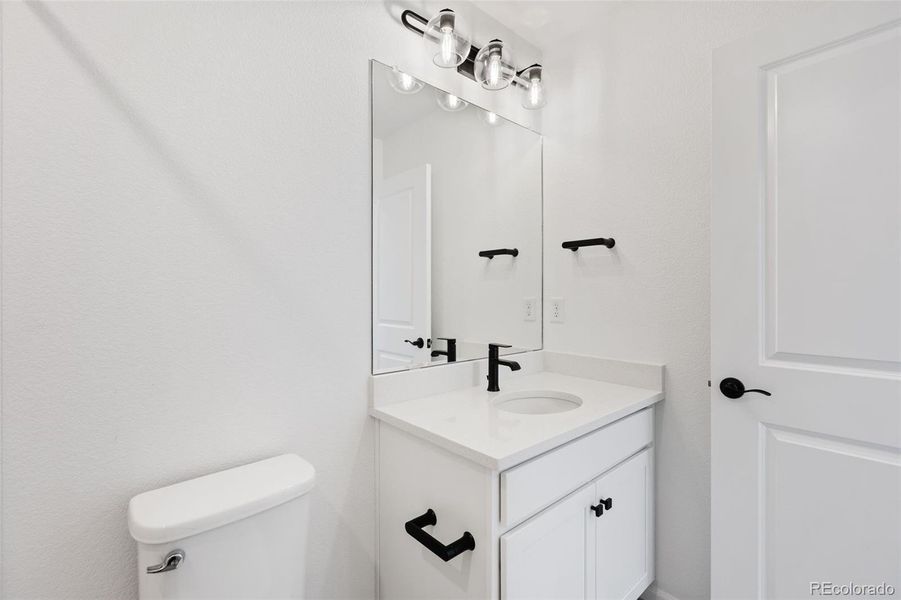 Furnished interior view inside a new home in Woodrose at Painted Prairie, Aurora (Image 7).