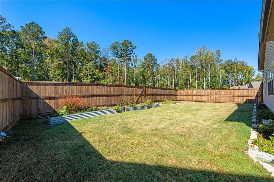 Exterior details and patio area of a home in Candleberry Place, Sharpsburg (Image 30).