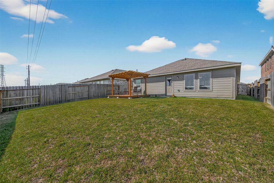 Exterior details and patio area of a home in , Baytown (Image 24).