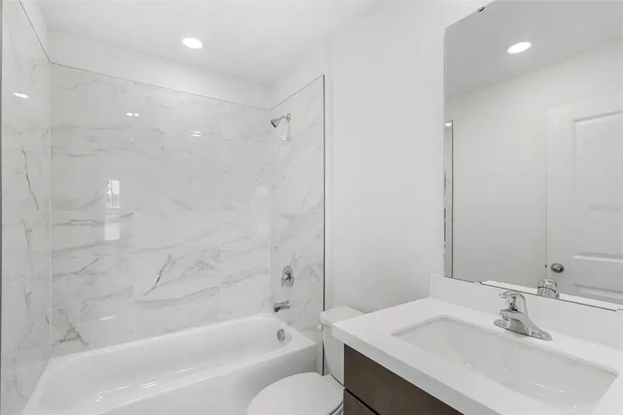 Furnished interior view inside a new home in Eden Crest, Apopka (Image 14).