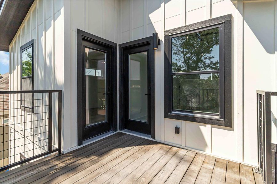 Deck access doors from both the loft and the second-level bedroom create seamless indoor-outdoor living. Deck access doors from both the loft and the second-level bedroom create seamless indoor-outdoor living.