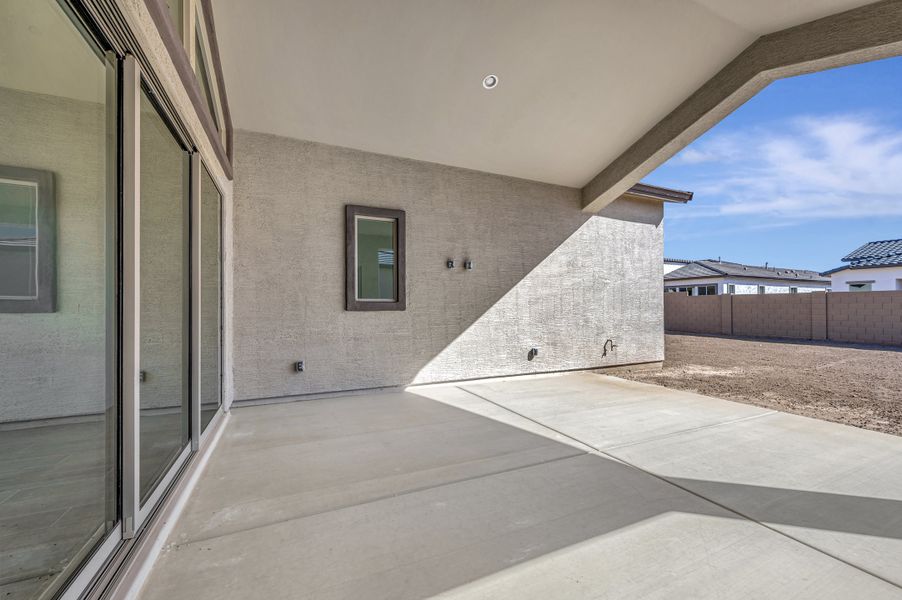 Exterior details and patio area of a home in Suelo at Legado West, Queen Creek (Image 4).