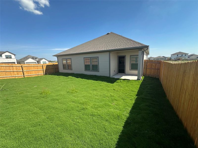 Rear of Home & Private Backyard