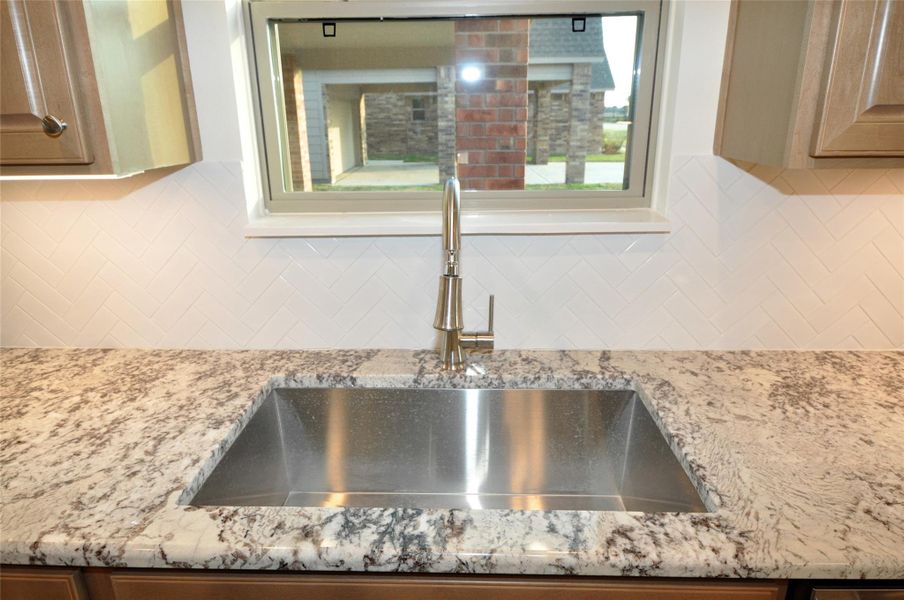 Undercounted Stainless Kitchen Sink.
