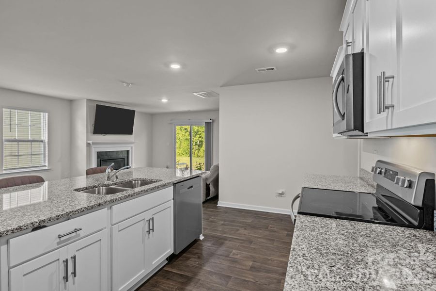 Furnished interior view inside a new home in Mills at Long Creek, Dallas (Image 8).