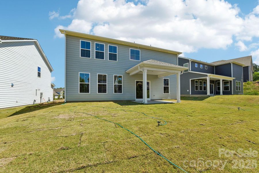 Exterior details and patio area of a home in Westport, York (Image 26).
