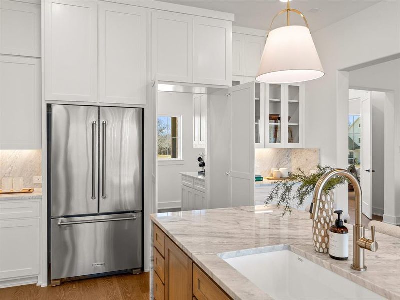 Hidden walk-in pantry.