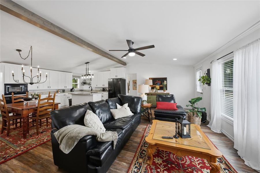 Open-concept living space with wood-finish flooring throughout