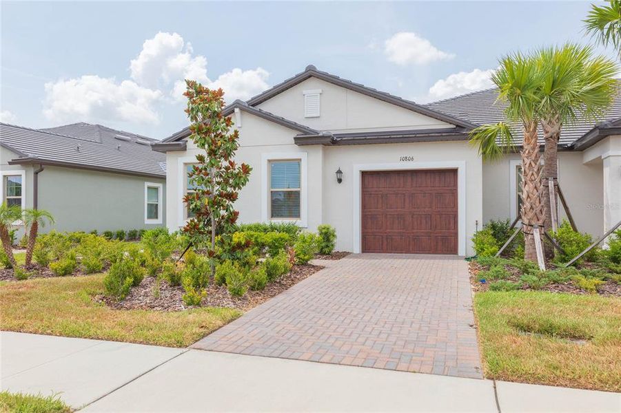 Front exterior of a new home in , San Antonio, FL, highlighting curb appeal (Image 2). Front exterior of a new home in , San Antonio, FL, highlighting curb appeal (Image 2).