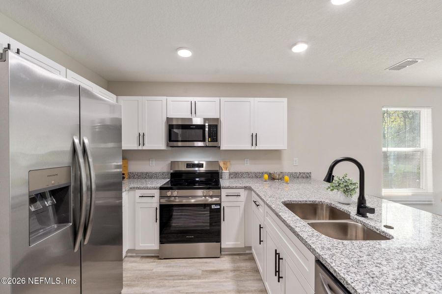 Furnished interior view inside a new home in , Jacksonville (Image 6).