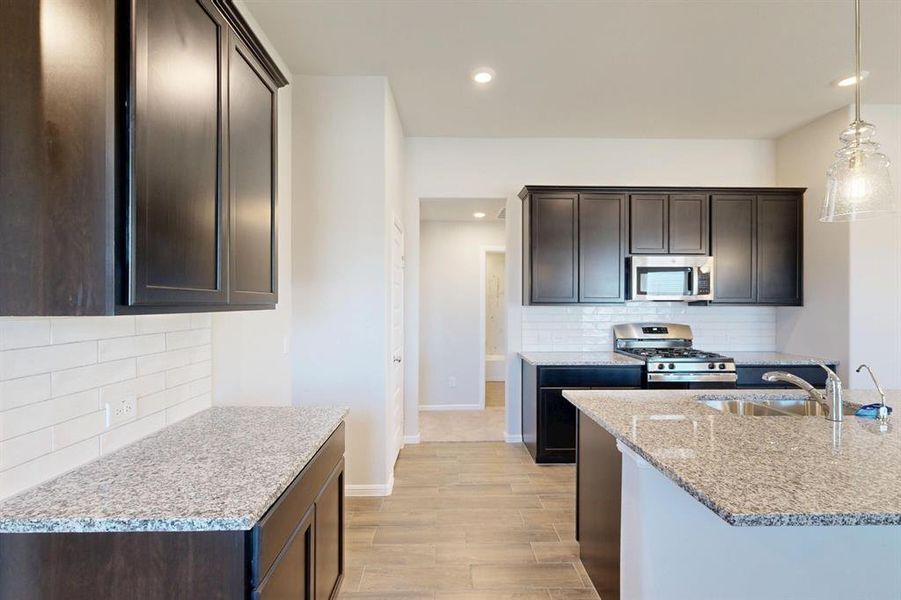 Furnished interior view inside a new home in Mobberly Farms, Pilot Point (Image 11).