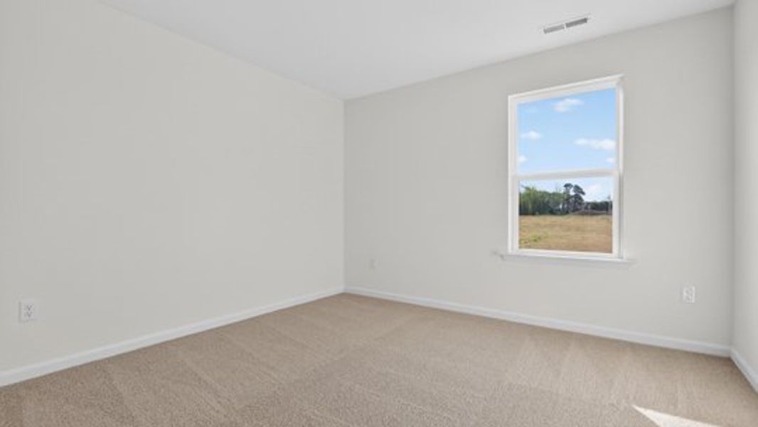 Spacious, unfurnished interior of a new home in The Reserve at Prestleigh, Wake Forest (Image 25).
