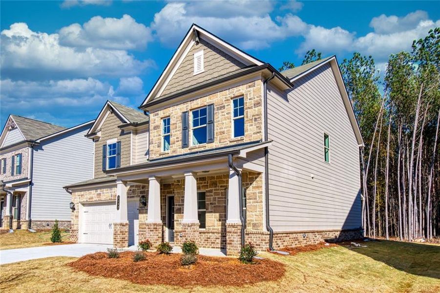 Exterior details and patio area of a home in Enclave at Logan Point, Loganville (Image 21).