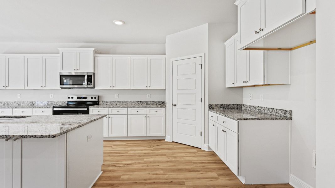 Representative furnished interior of a home built from the The Hawthorne by D.R. Horton in Meadows at Rehwinkel, Crawfordville (Image 31).