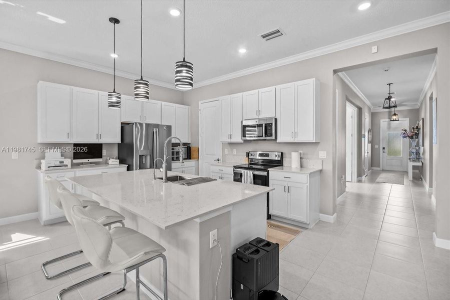 Furnished interior view inside a new home in Veranda Preserve, Port St. Lucie (Image 8).