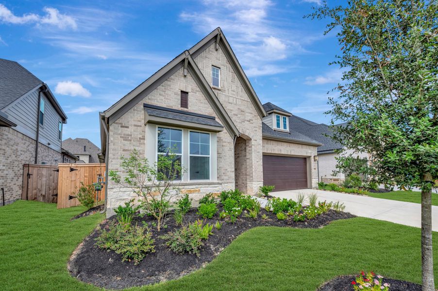 Front exterior of a new home in The Grand Prairie - Retreat Collection, Hockley, TX, highlighting curb appeal (Image 26).
