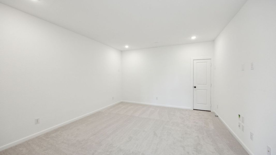 Representative unfurnished interior of a home built from the Royale II by Normandy Homes in Village on Main Street, Frisco (Image 15).