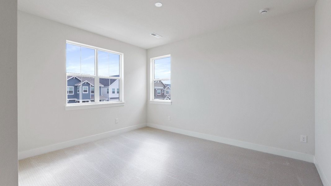 Furnished interior view inside a new home in Dillon Pointe - Journey, Broomfield (Image 24).