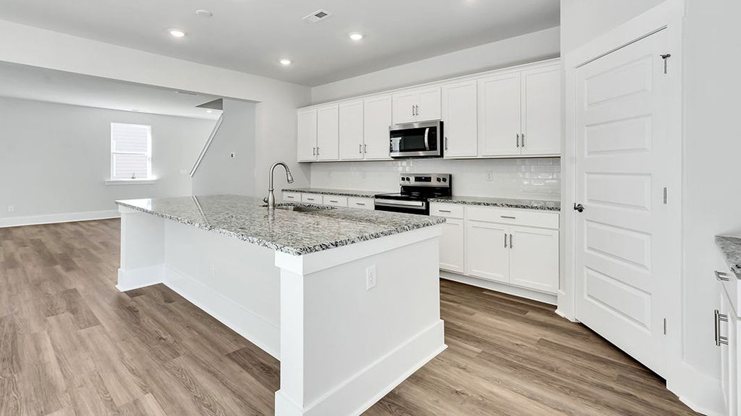 Furnished interior view inside a new home in The Haven at Indigo Preserve, Leland (Image 8).