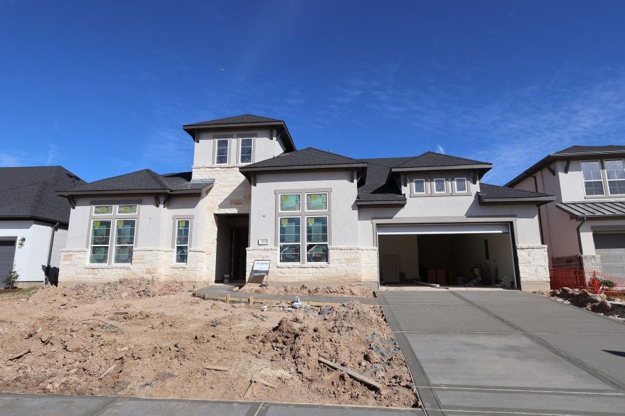 In-progress construction of a new home in Woodson’s Reserve, Spring, TX (Image 6).