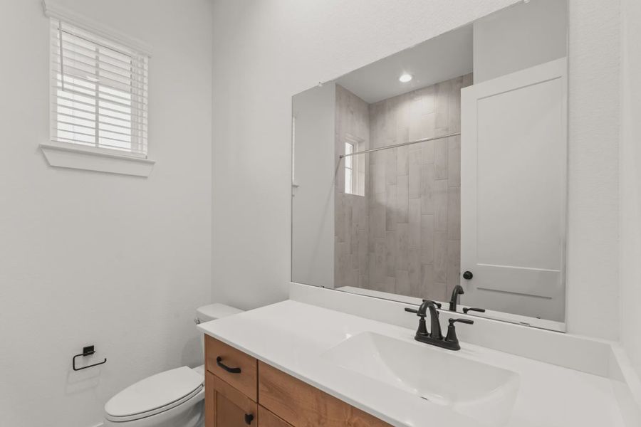 Representative furnished interior of a home built from the Sorenstam by Chesmar Homes in Riceland Alley Loads, Mont Belvieu (Image 46).