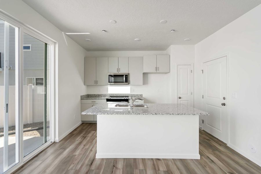 Furnished interior view inside a new home in Reunion, Commerce City (Image 4).