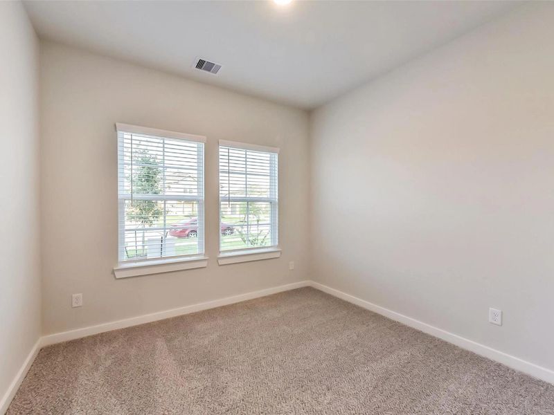 Spacious, unfurnished interior of a new home in Sunterra, Katy (Image 28).