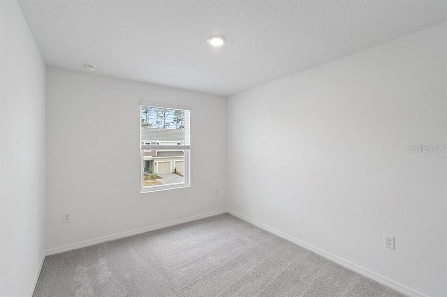 Spacious, unfurnished interior of a new home in Waterstone Townhomes, Groveland (Image 18).