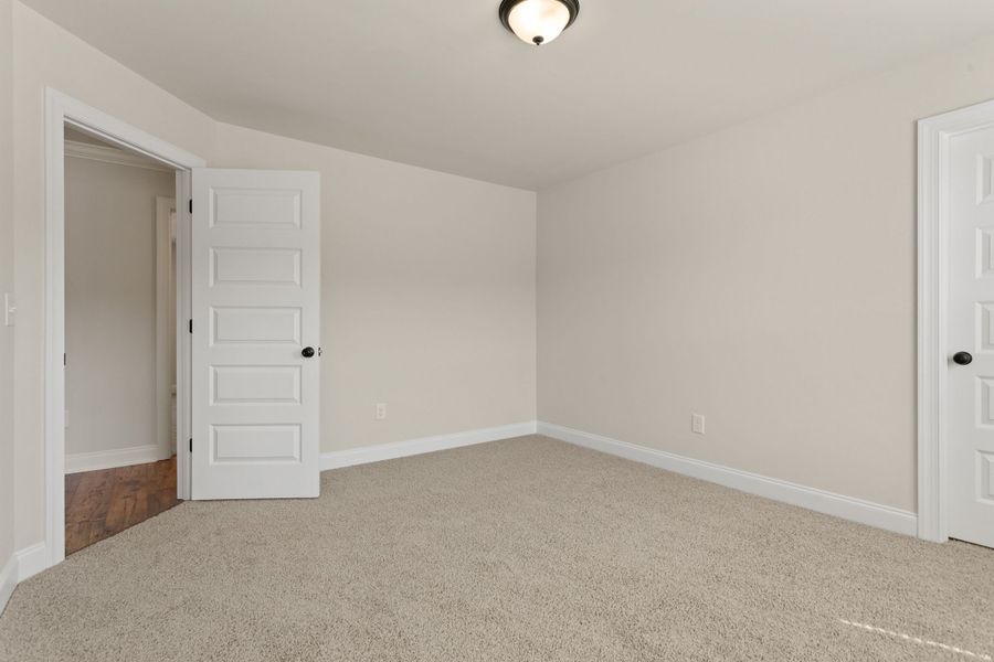 Spacious, unfurnished interior of a new home in Cherokee Knoll, Williamston (Image 27).